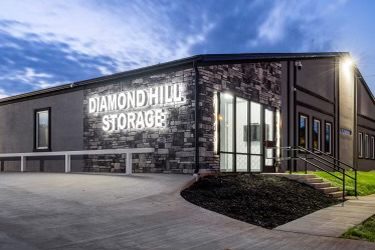 A building with a sign that says diamond hill storage.